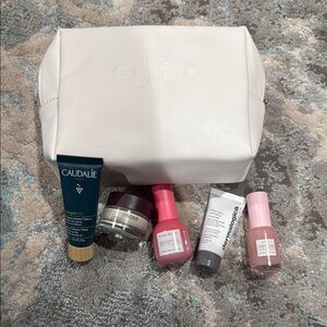 OSEA White Cosmetic Bag with Skincare Products